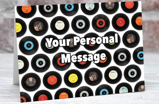 a birthday or greetings card showing a mosaic of seven inch vinyl record singles along with a personalised message on the card