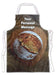 A kitchen apron flat on the floor, the apron having an image of a large sourdough loaf on top of a wooden heart shaped tray