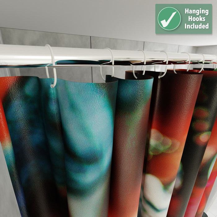 close up of the top of a shower curtain showing hanging hooks, there is overlay text on the image describing the curtain