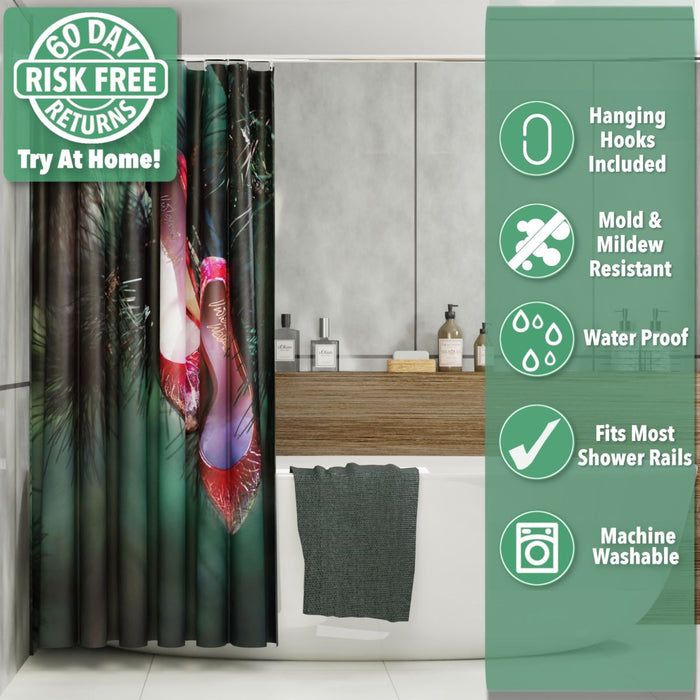 A shower curtain in a bathroom, the curtain having an image of a pair of red high heel shoes hanging of the branch of a tree, the curtain is pushed and folded back