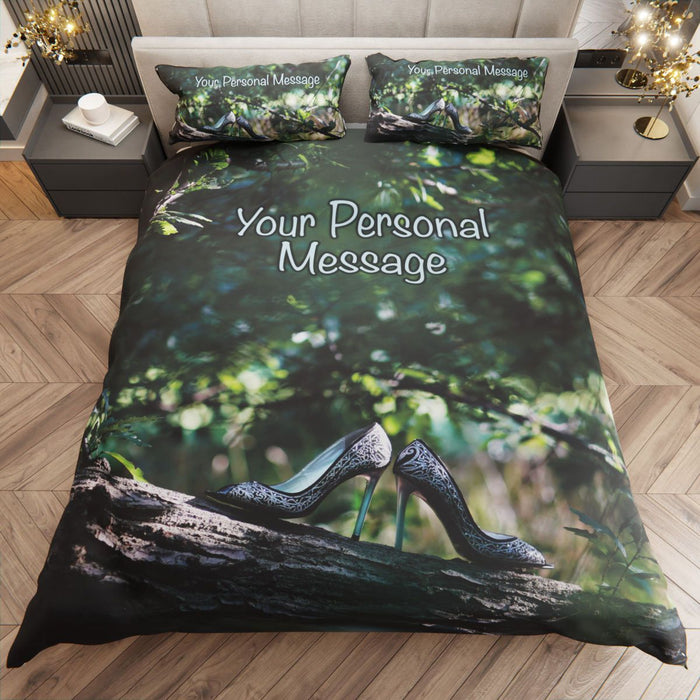 A duvet cover on a bed, the duvet showing image of a pair of shoes resting on the brach of a tree within a forest, along with a personal message on the duvet
