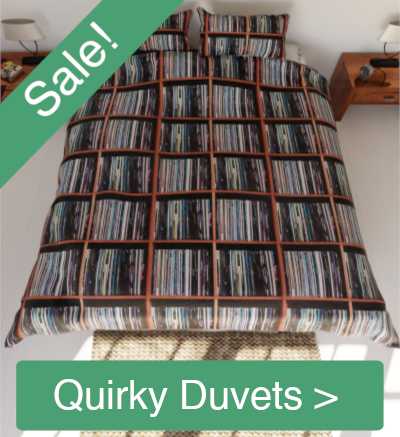 a duvet cover with a vinyl record display on it along with a banner saying quirky duvets
