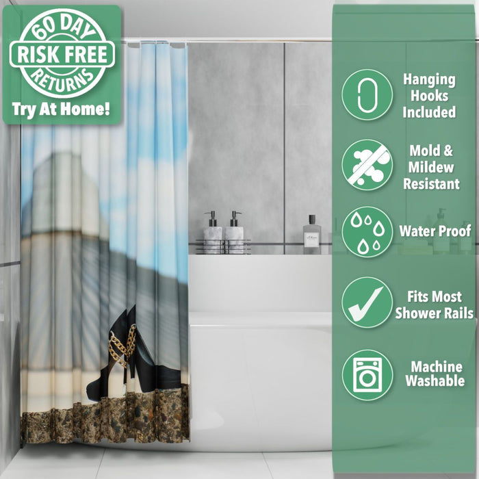 A shower curtain in a bathroom, the shower curtain having an image of a pair of black high heel shoes on a wall in the foreground, with a building and city skyline in the background, the curtain is folded back