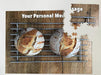 A partially broken jigsaw with an image of two sourdough loaves seen from directly overhead, the loaves sitting on a metal tray along with a printed personal message