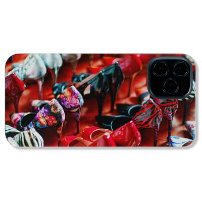 A phone case with lots of red shoes lined up along side each other showing a large shoe collection