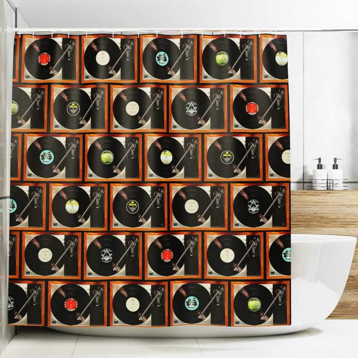 a shower curtain in pulled open position with a montage of record players, with different vinyl records playing