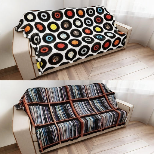 Sofa with vinyl record-themed cover and another with a striped pattern on a wooden floor.