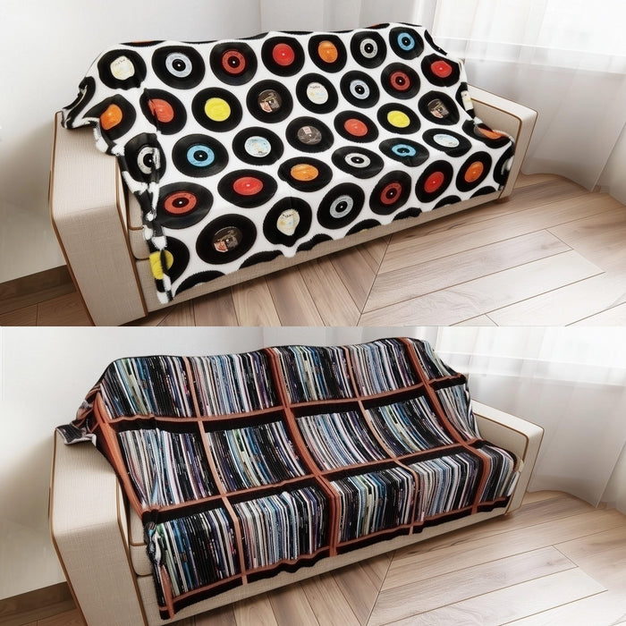 Sofa with vinyl record-themed cover and another with a striped pattern on a wooden floor.