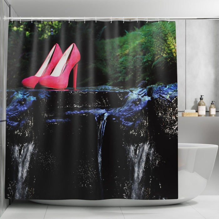 A shower curtian in a bathroom, the curtain showing the image of a pair of pink high heel shoes sat on a rock in the middle of a flowing river