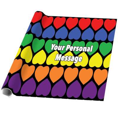 A roll of wrapping paper showing rows of hearts, each row of the hearts is a continuous colour with each row being a colour from the pride rainbow flag