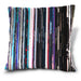 a cushion, the cushion having an image of multiple vinyl records stacked along a shelf