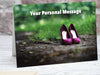 A greeting card showing a pair of purple high heel shoes standing on a woodland path, along with a personal message