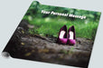 A roll of wrapping paper with an image of a pair of purple high heel shoes standing on a woodland path