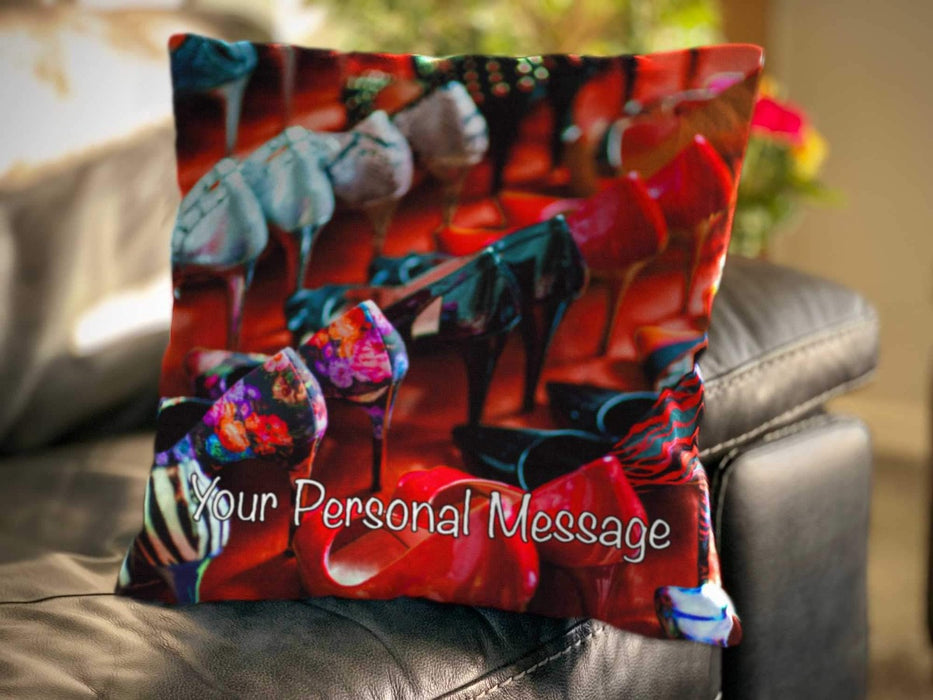 An image of a cushion on a couch, the cushion cover showing lots of high heel shoes arraged in rows, along with a personal message on the cover