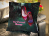 An image of a cushion on a couch, the cushion having a cover showing a pair of pink high heel shoes hanging from a tree, the cushion also has a personal message printed on it