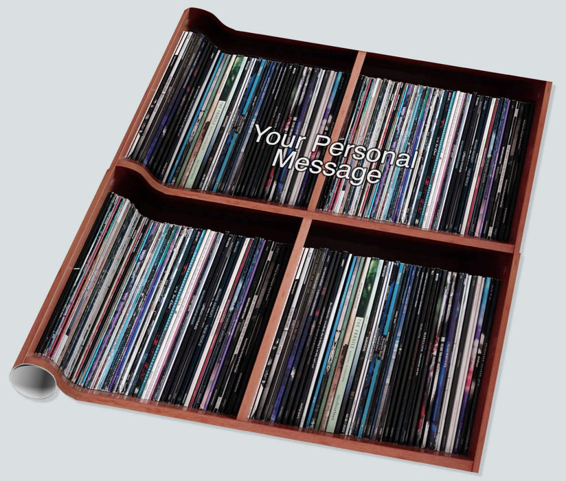gift wrapping paper laid out flat, showing large image of vinyl records stacked along a shelf with a personal message