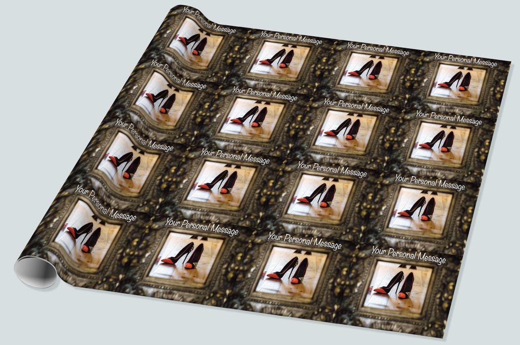 A roll of wrapping paper showing a mirror, the mirror surrounded by a brass mount, an in the mirror is a reflection of a pair of orange high heel shoes along with a personal messa, the image is repeated in a mosaic
