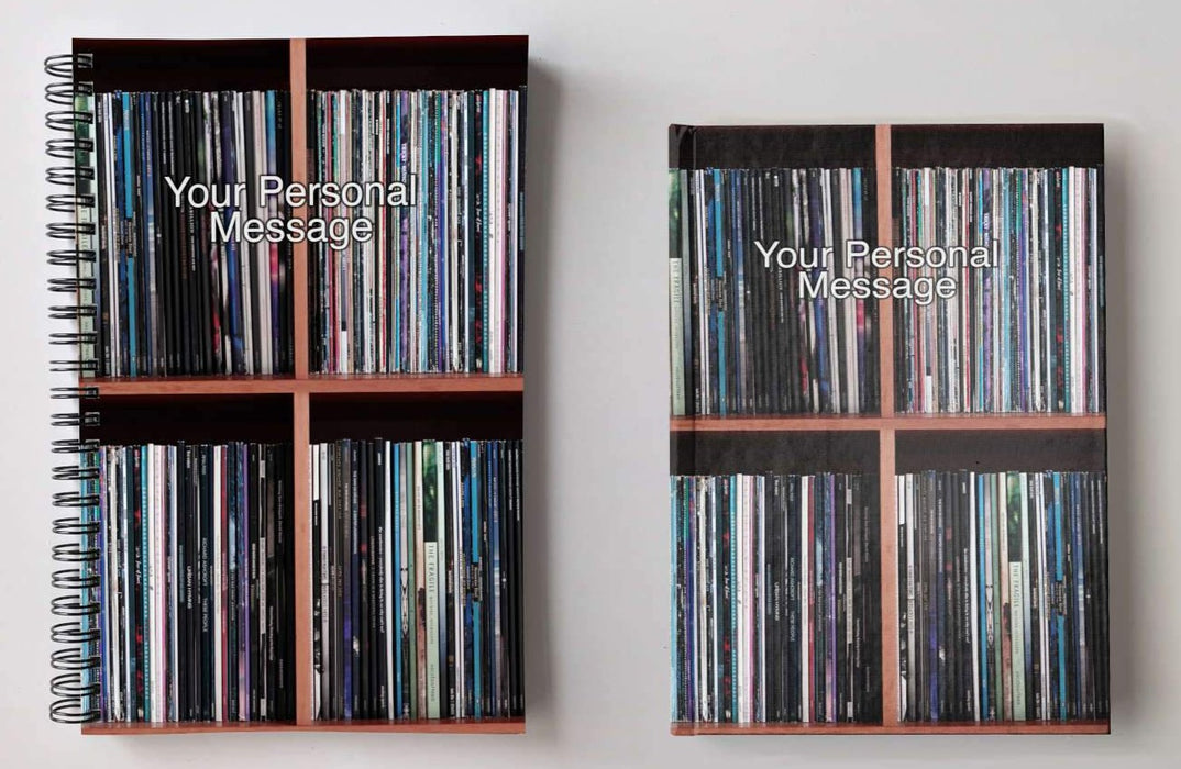 a pair of notebooks, one spiral bound and one hard back, both with image of vinyl records stacked along a shelf with a personal message printed