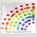 A tapestry hung on a white wall, the tapestry has a series of polka dots on it, the polka dots coloured with a rainbow colour on a white background, along with a personal message printed