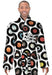 A man wearing a dressing gown, the dressing down is decorated with a montage of vinyl records along with a printed personal message