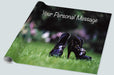 A roll of wrapping paper showing a close up of pair of high heeled purple ankle boots on grass in a garden, with faint images of flowers in the background along with a perosnal message
