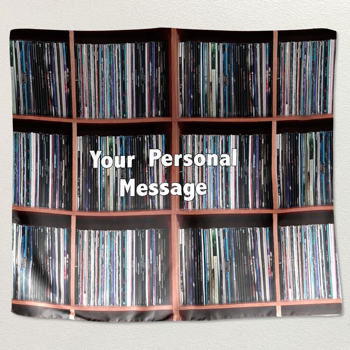 A tapesty showing an image of a cupboard with lots of records in it,along with a personal message