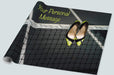 A roll of wrapping paper showing pair of high heeled shoes hung over a tennis net on a tennis court, the shoes being yellow in colour, along with a personal message